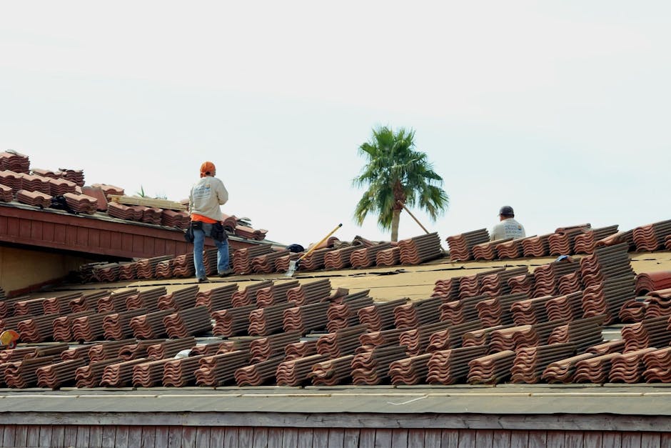 Professional roofing contractor working on residential project - quality exterior work